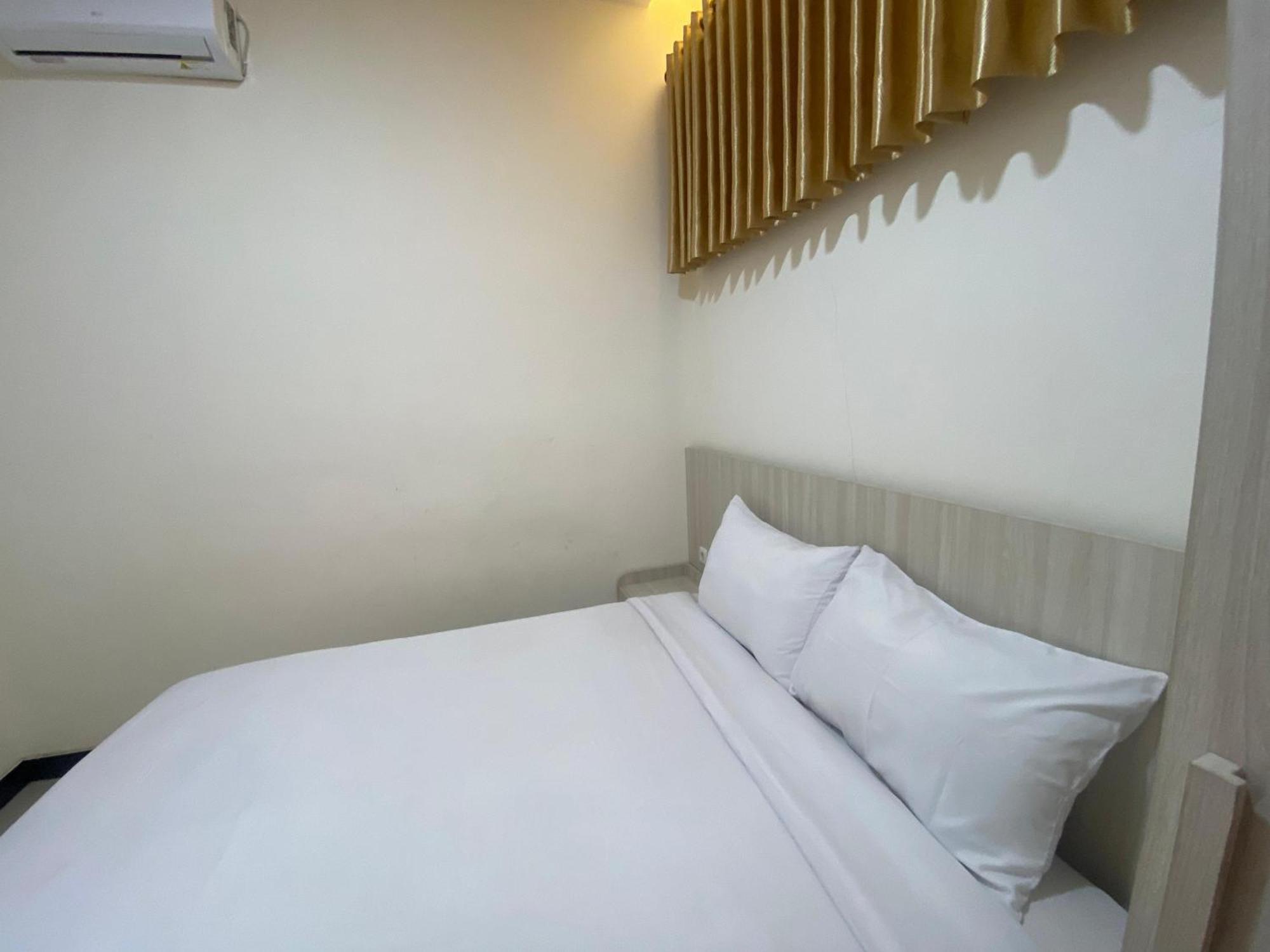 Kanggo Riko Family Homestay Mitra Reddoorz Banyuwangi  Extérieur photo