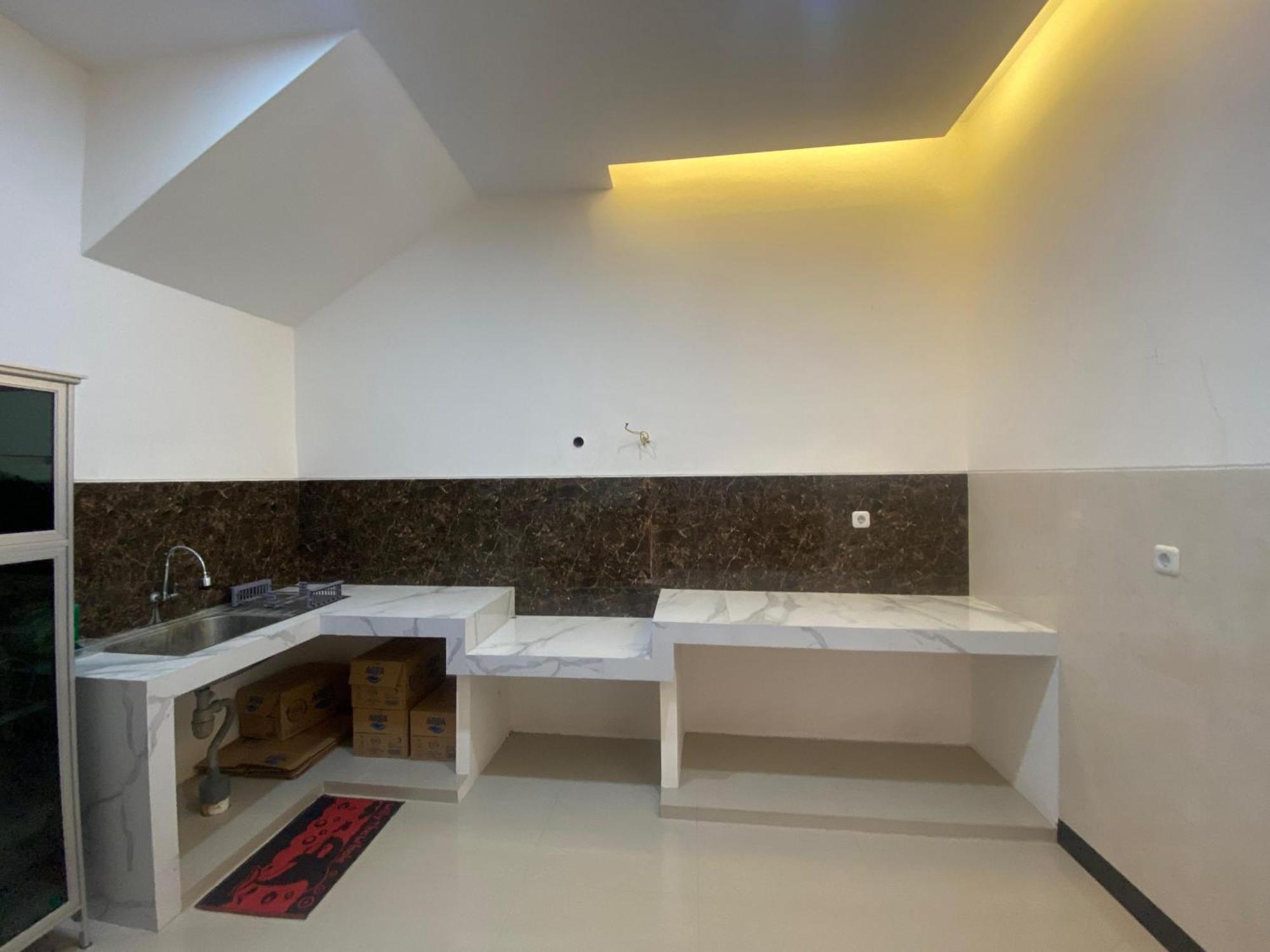 Kanggo Riko Family Homestay Mitra Reddoorz Banyuwangi  Extérieur photo